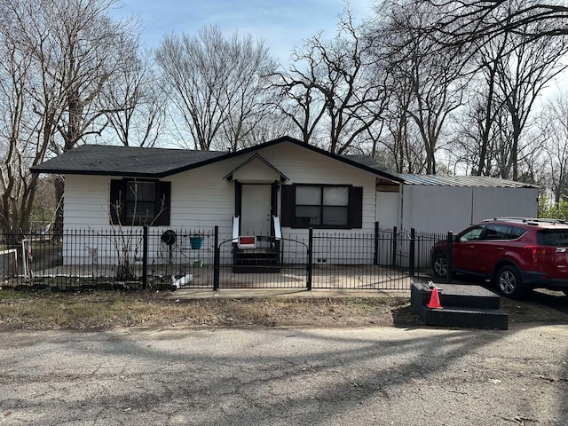 view of front of house with a fenced front yard