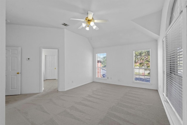 interior space featuring ceiling fan and vaulted ceiling