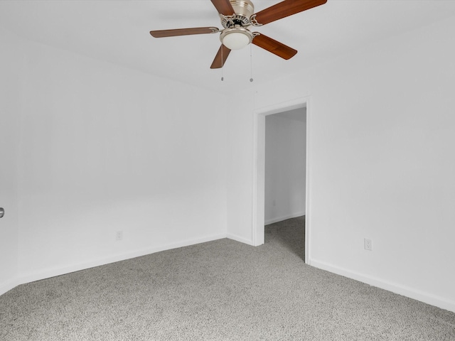 unfurnished room with carpet floors and ceiling fan