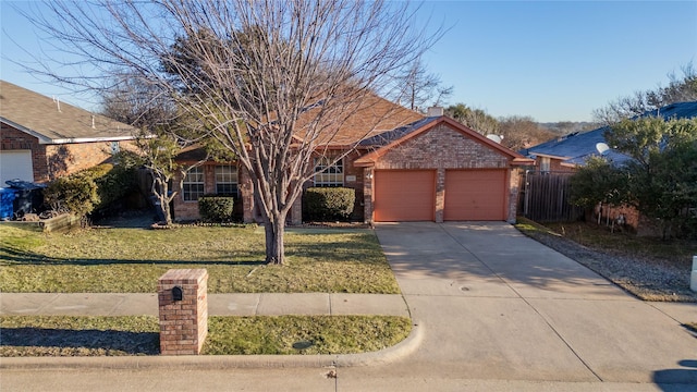 single story home featuring a garage and a front yard