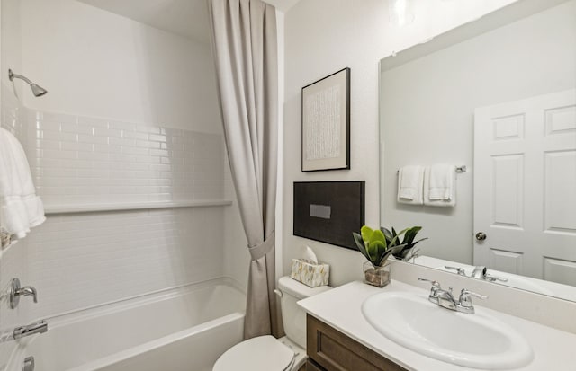 full bathroom with vanity, toilet, and shower / bath combo