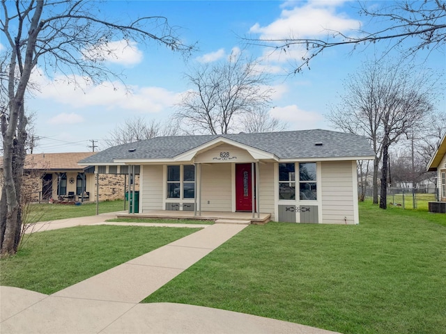 ranch-style home with covered porch and a front lawn