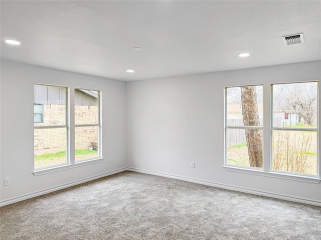 view of carpeted spare room