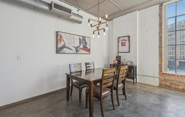 dining space featuring a chandelier