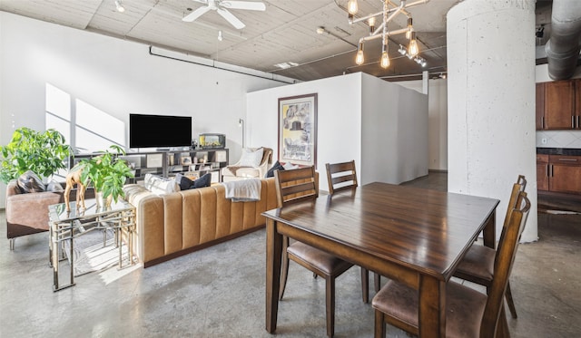 dining room featuring ceiling fan