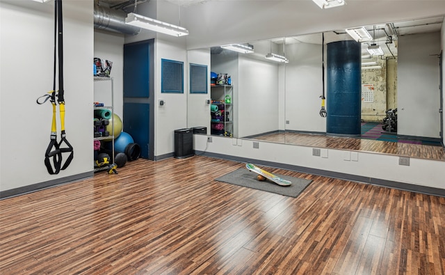 workout room featuring dark hardwood / wood-style floors