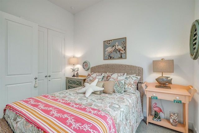 carpeted bedroom featuring a closet