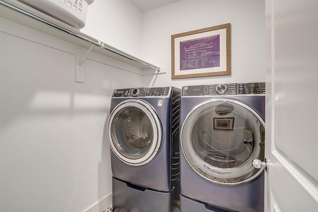 laundry area with washer and dryer