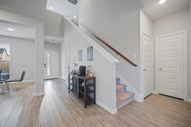 foyer with light hardwood / wood-style flooring