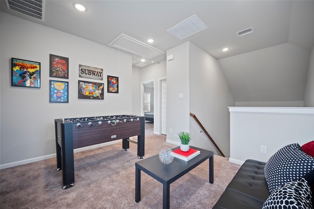 rec room with lofted ceiling and carpet