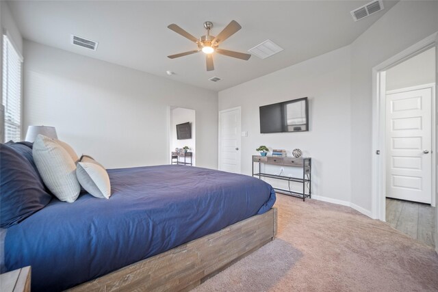 carpeted bedroom featuring ceiling fan