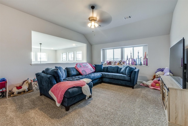 living room with carpet floors, ceiling fan, and vaulted ceiling