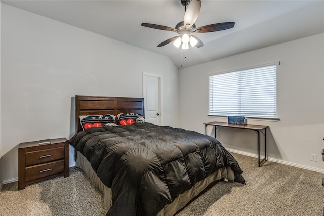 carpeted bedroom with ceiling fan and lofted ceiling