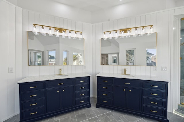 bathroom featuring vanity and decorative backsplash