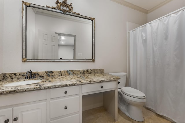 bathroom featuring crown molding, vanity, and toilet