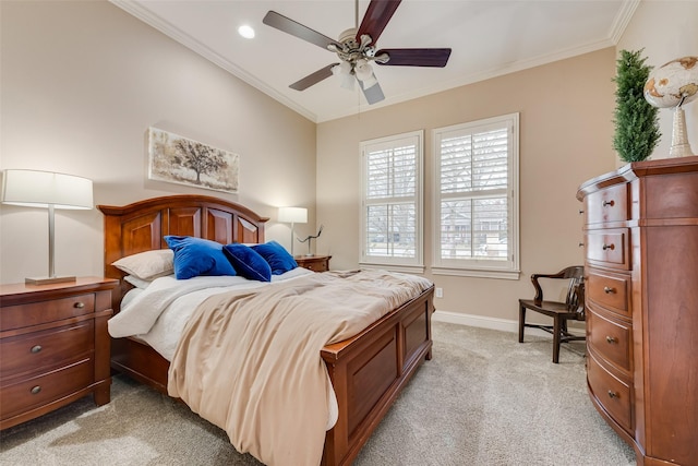 bedroom featuring crown molding, ceiling fan, and light colored carpet