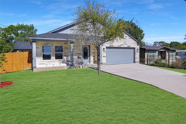 view of front facade featuring a garage and a front yard