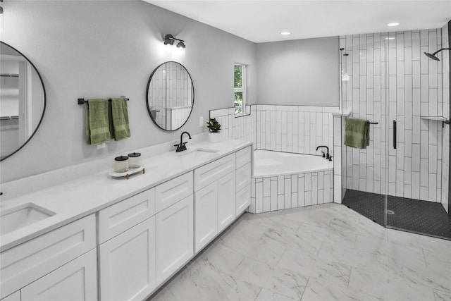 bathroom featuring vanity and plus walk in shower