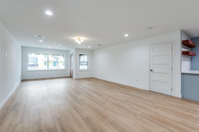 unfurnished room featuring light hardwood / wood-style flooring