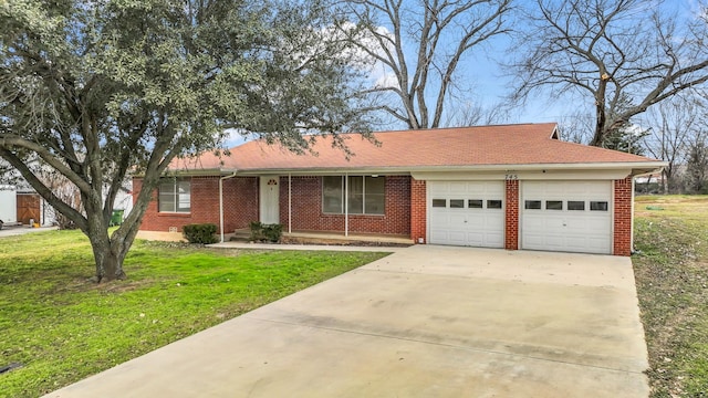 single story home featuring a garage and a front lawn