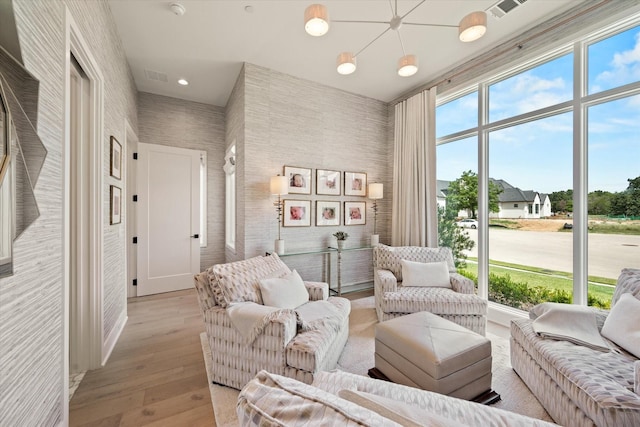 living area with light hardwood / wood-style flooring