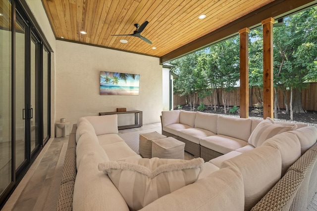 view of patio / terrace with an outdoor living space and ceiling fan