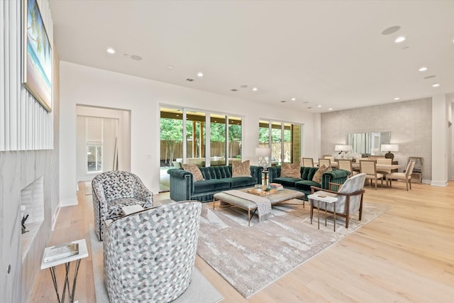 living room with light hardwood / wood-style flooring