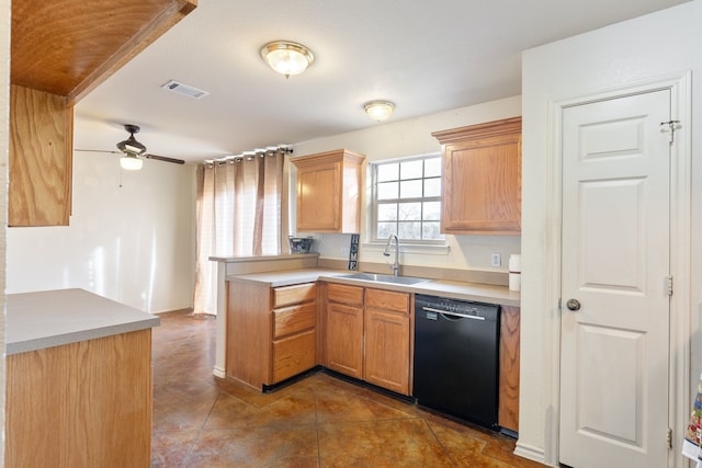 kitchen with sink, ceiling fan, tile patterned flooring, black dishwasher, and kitchen peninsula