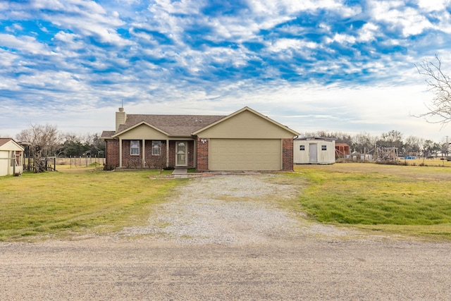 ranch-style home with a garage and a front yard