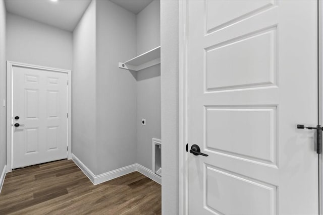 laundry room featuring dark hardwood / wood-style floors and hookup for an electric dryer