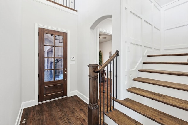 entrance foyer featuring dark wood-type flooring