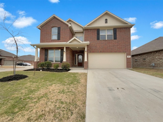 view of property featuring a garage and a front yard