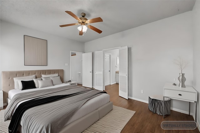 bedroom featuring dark hardwood / wood-style floors and ceiling fan