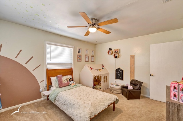 bedroom with ceiling fan and carpet flooring