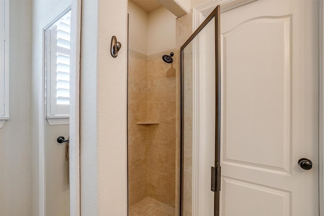 bathroom with an enclosed shower