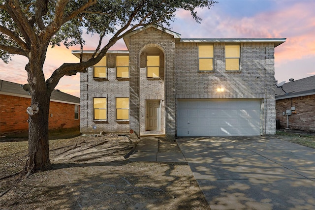 front of property with a garage