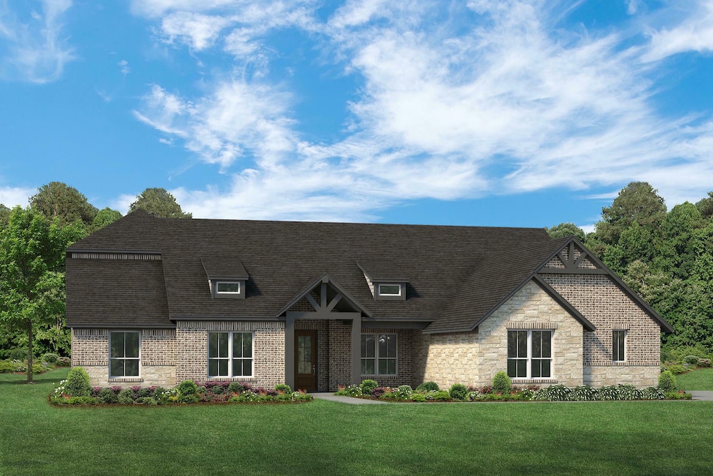 view of front facade with a front yard