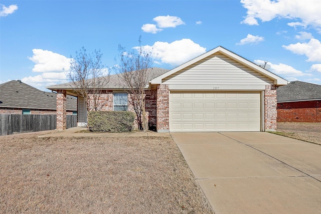 ranch-style house featuring a garage