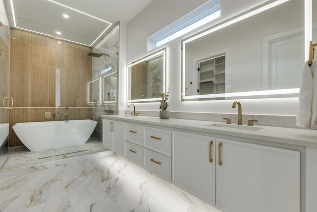 bathroom featuring vanity and separate shower and tub