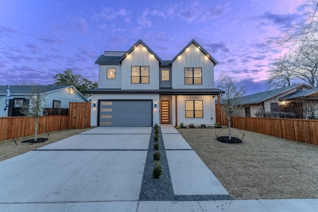 modern farmhouse style home with a garage