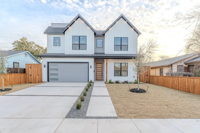 modern farmhouse style home with a garage