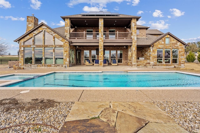 view of pool with a patio area