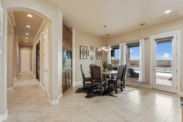 dining room with light tile patterned flooring