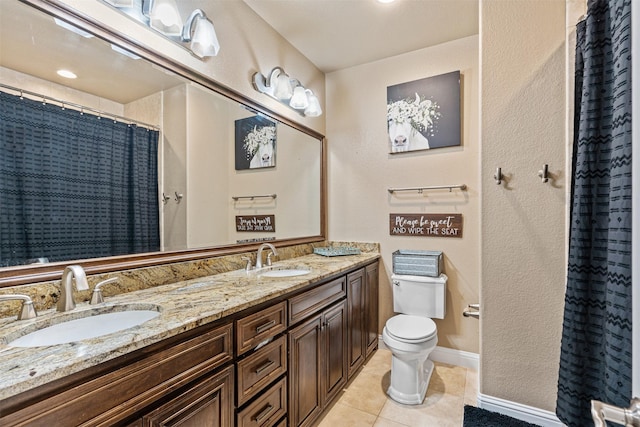 bathroom with tile patterned floors, toilet, a shower with shower curtain, and vanity