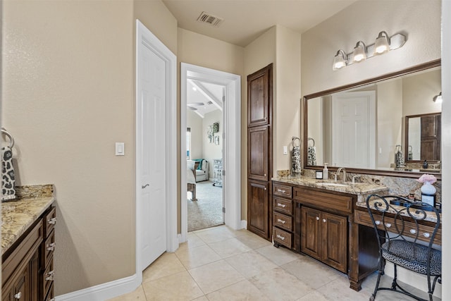 bathroom featuring vanity and tile patterned floors