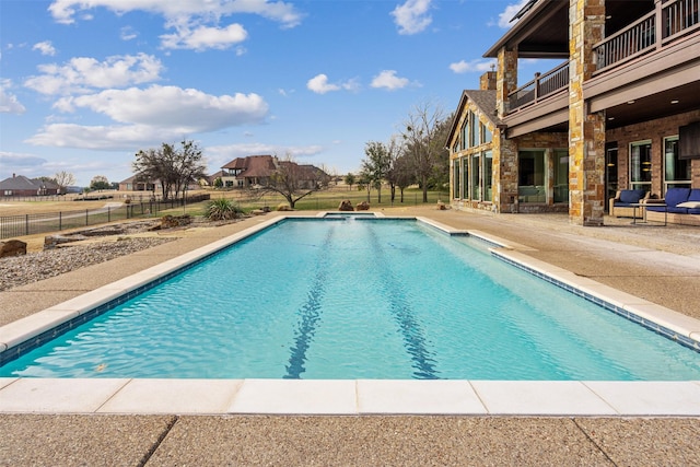 view of pool with a patio