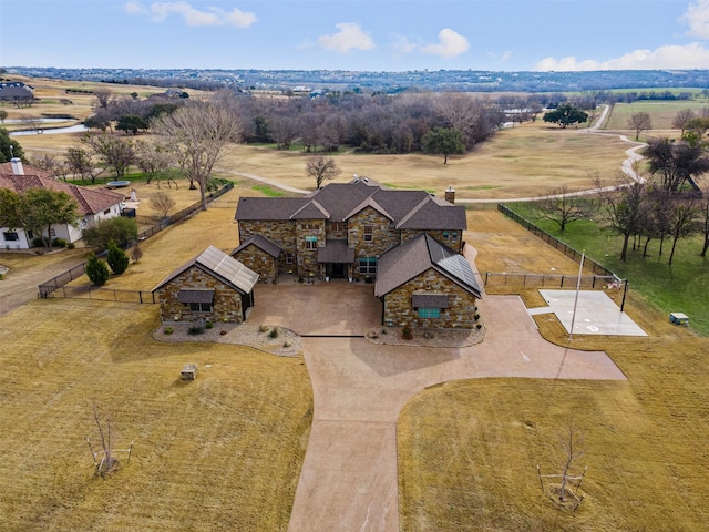 birds eye view of property featuring a rural view