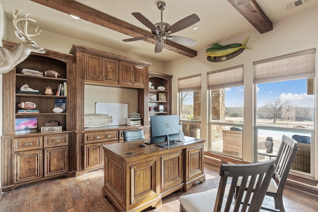 office featuring beamed ceiling, ceiling fan, and dark hardwood / wood-style flooring