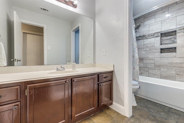 full bathroom featuring shower / bath combination with curtain, vanity, and toilet