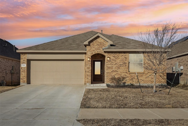 view of front of home featuring a garage